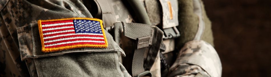 Military uniform with a patch of the American flag on the arm